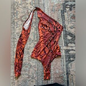 Red, snake print one sleeve bodysuit
